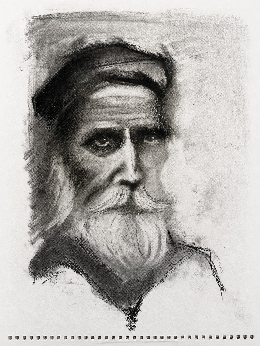 Charcoal portrait of a bearded man, drawn by Daniela Diaconu